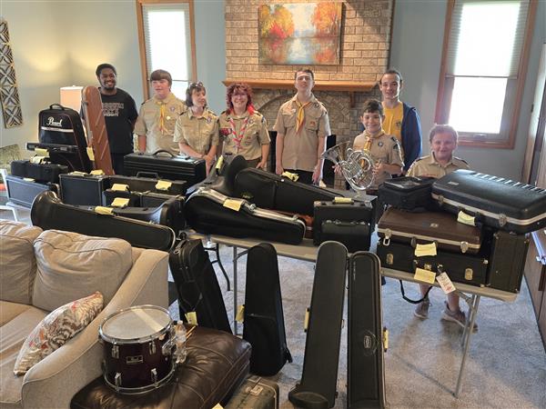  Sara Rubelee collects instruments to donate to SPS as part of her Eagle Scout service project.